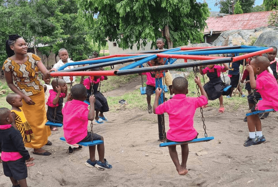 Children in safe outdoor play environment