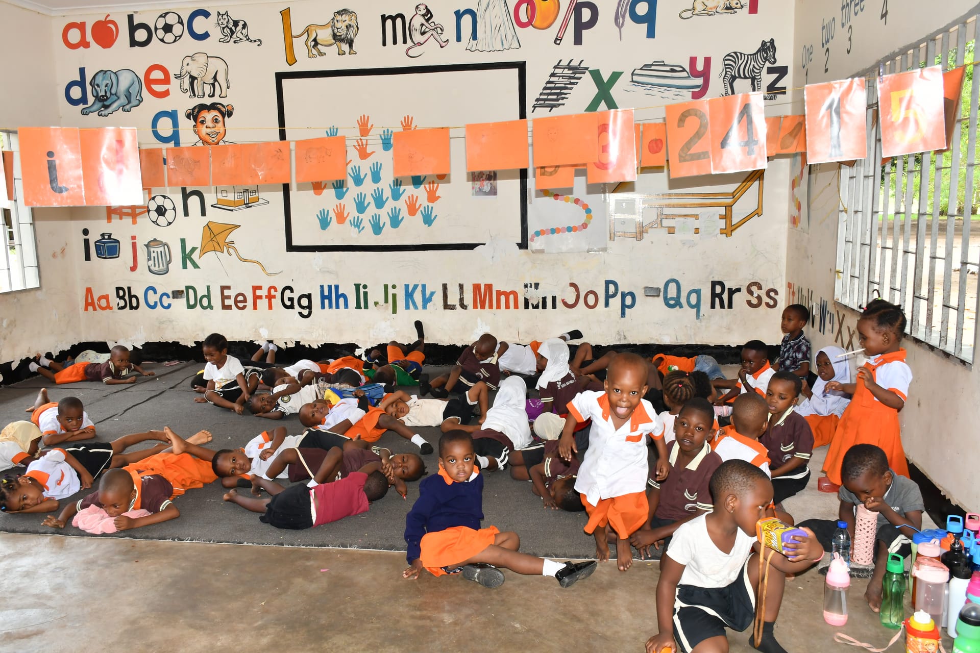 Young children in daycare learning activities