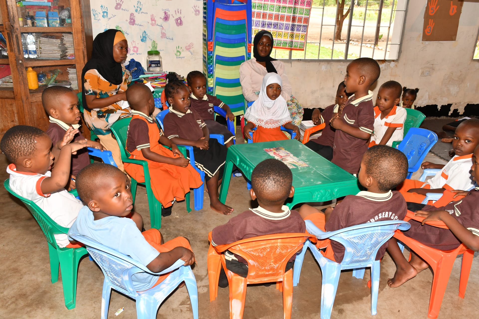 Children in a bright daycare classroom at an FDC