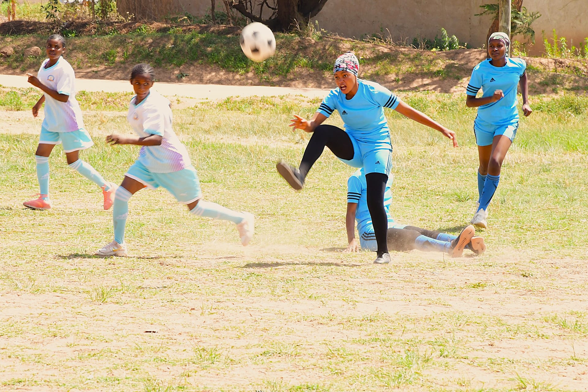 Player taking a powerful kick during match