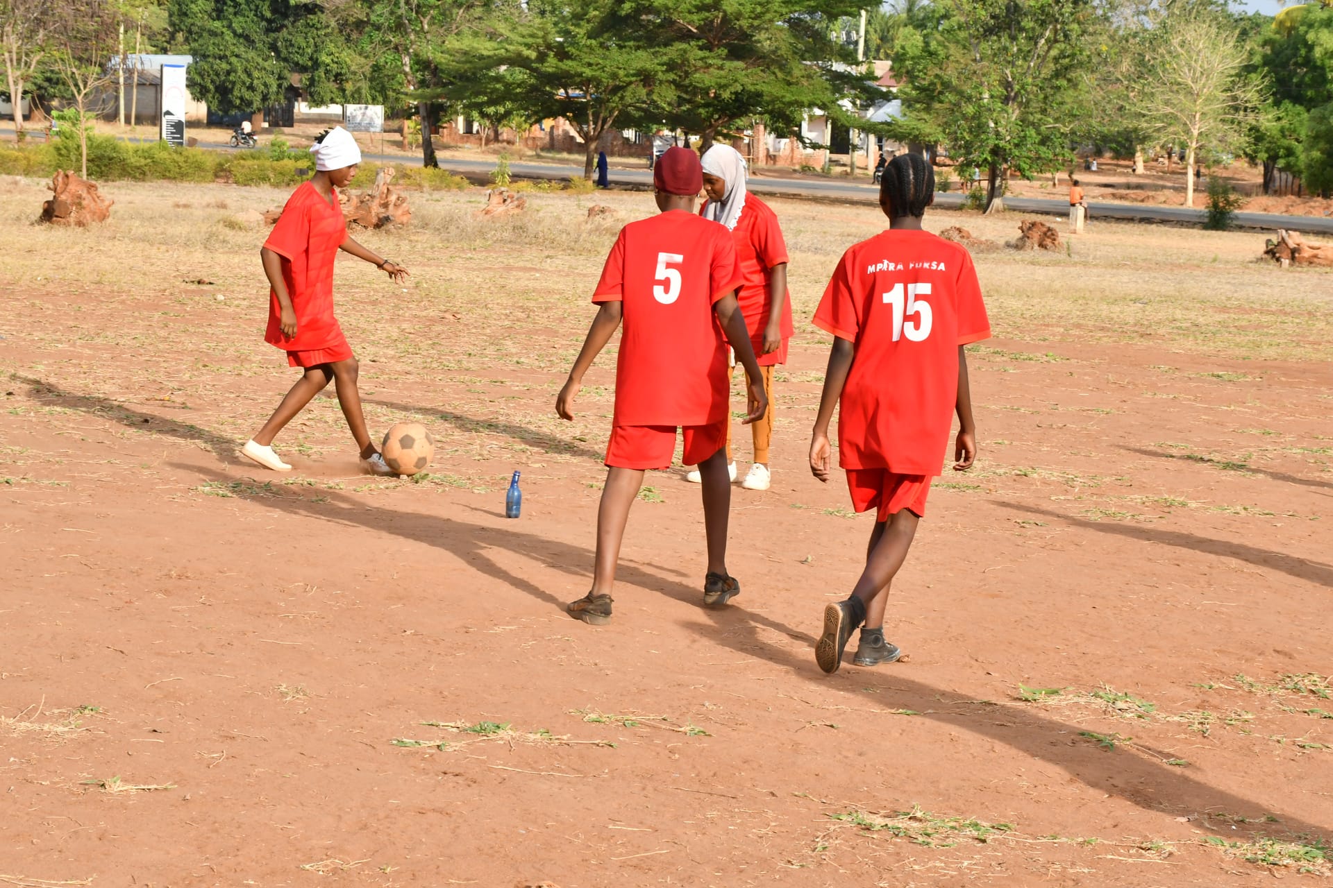 Young footballers building teamwork skills